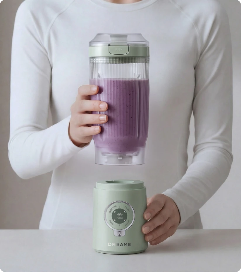 Dreame Portable Blender Twist & Go Funktion zeigt den abnehmbaren Mixbecher beim Trennen von der Basis